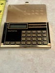 Aurora Pocket Calculator Gold Flip Case. Fixed Price $5.95.