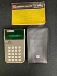 1975 Sharp Elsi Mate El-8000r Calculator With Original Instructions & Soft Case. Fixed Price $24.99.