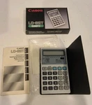 Vintage Canon Lc-82t Quartz Electronic Calculator W/case & Manual New In Box. Fixed Price $24.97.