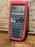 Texas Instruments Ti-89 Titanium Graphing Calculator & Protective Silicone Cover. Fixed Price $35.00.