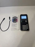 Texas Instruments Ti-84 Plus Ce Graphing Calculator - Black With Cord And Papers. Fixed Price $74.99.