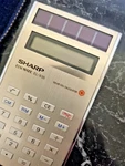 Vintage Sharp Elsi Mate El-835 Solar Cell Calculator In Velvet Sleeve Japan 1981. Fixed Price $125.53.