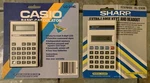 Lot Of 2 - Vintage Casio Lc-311c & Sharp El-230b Portable Basic Calculator New. Fixed Price $29.99.