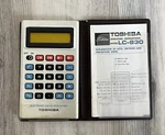 Vintage Toshiba Model Lc-830 Ultra Thin Lcd Calculator With Case & Manual. Fixed Price $9.99.