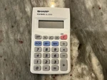 Sharp Handheld Calculator, Elsi Mate, El-233s. Fixed Price $15.00.