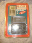 Vintage Sharp Electronic Organizer Bonus Package El-6460 El-233g. Fixed Price $10.00.