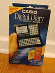 New In Box Casio Digital Diary Sf-400 W Travel Guide Book Planner Schedule. Fixed Price $80.00.