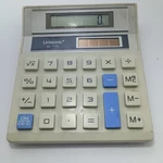 #f) Vintage Unisonic Xl-1110 Solar Calculator. Fixed Price $16.00.