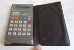 Vintage Sharp Elsi Mate El-8156 Calculator Pocket Size With Case. Fixed Price $4.99.