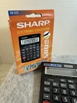 Calculator Sharp Electronic Ch-312 Solar Powered. Fixed Price $16.00.