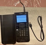 Texas Instruments Ti Nspire Cx Cas Graphing Calculator With Charger And Cover. Fixed Price $60.00.