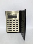 Vintage Tozaj Credit Card Calculator Model E-259 Brown Case - Works As Should. Fixed Price $12.00.