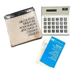 Vintage Novus Mini Desk Calculator Ns838 With Manual & Original Box New Tested. Fixed Price $16.00.