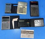 Vintage Calculator Lot Of 5 Canon Ls-81z, Sharp & Texas Instruments. Fixed Price $6.50.