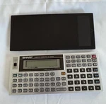 Sharp El-5500 Ii Scientific Calculator & Basic Computer Needs Batteries. Fixed Price $29.99.