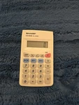 Sharp Elsi Mate El-233s - Basic Pocket Calculator Good Condition. Fixed Price $4.00.