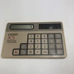 Citizen X5 Solar Cell Thin Pocket Calculator. Fixed Price $18.00.