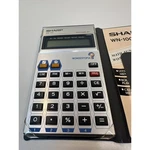 Vintage '80's *new In Box* Sharp Wn-100 Wondertopia Calculator. Fixed Price $130.00.