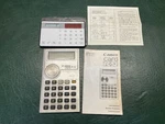 2 Vintage Calculators Canon Card Fc-52 Metric Converter Calculator & Unmarked. Fixed Price $22.00.
