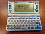 Sharp Oz-770 Wizard Personal Information Organizer Works Display Issues. Fixed Price $40.00.