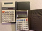 Lot Of 2 Vintage Calculators- Sharp Elsi Mate El-326h & Unisonic Solar Cell. Fixed Price $17.99.