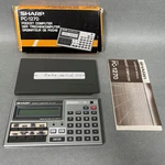 Vintage Sharp Pc-1270 Pocket Computer Calculator W/ Ce-212m 8k Ram Card Working. Fixed Price $50.00.