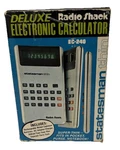 Vintage Radio Shack Statesman Thin Lcd Calculator Open Box With Manual. Fixed Price $19.97.