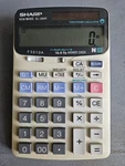 Sharp Elsi Mate El-386r Calculator, Power: Battery & Solar, Extra Large Display. Fixed Price $55.00.