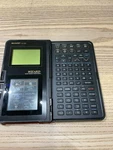 Vintage Sharp Oz-7000 Wizard Electronic Organizer Calculator. Fixed Price $24.00.