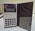 Vintage Casio Fx-910 Solar Scientific Calculator W/ Vinyl Case 3" X 5". Fixed Price $13.50.