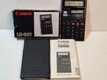 Canon Lc-64t Foreign Currency Converter Quartz Card Calculator In Box. Fixed Price $10.00.