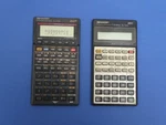 Lot Of 2 Calculators Sharp El-512h, El-733a. Fixed Price $20.00.