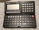 Vintage 1990 Unisonic Handheld Computer Diary. Fixed Price $24.99.