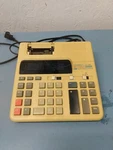 Vintage Unisonic Electric Desktop Printing Calculator (ll). Fixed Price $18.00.
