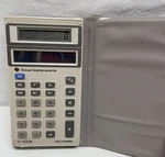 Vintage Texas Instruments Ti-1006 Light Powered Calculator With Case. Fixed Price $7.79.