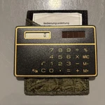 Vintage Ultra-slim Credit Card Solar Calculator W/ Decorative Sleeve - Works!. Fixed Price $9.99.
