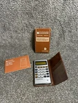 Lloyds Vintage Handheld Calculator E604 With Case And Original Box. Fixed Price $12.95.