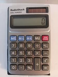 Radioshack Dual-powered Pocket Calculator W/auto-comma Cat No. 65-924. Fixed Price $15.00.