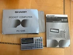 Vintage Sharp Pc-1246 Lcd Basic Pocket Computer Calculator. Fixed Price $350.00.