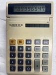 Vintage Canon Ks-81 Electronic Solar Calculator With Adjustable Angle Stand. Fixed Price $20.00.