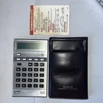 Vintage Casio Aq-2200 Universal Calendar Watch Calculator With Case And Insert. Fixed Price $19.99.