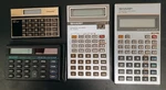 3 Sharp & 1 Unisonic Calculators, Need Batteries.. Fixed Price $14.95.