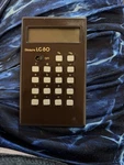 Vintage Sears Calculator Lc 80 With Brown Leather Cover Untested. Fixed Price $9.95.