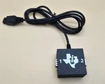 Texas Instruments Ti-99/4a Dual Atari Joystick Adapter With Wired Case (new). Fixed Price $24.99.