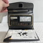 Vintage New Rare Unisonic International Travel Computer Handheld - Model 9595. Fixed Price $285.99.