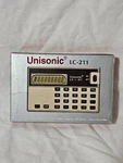 Vintage Unisonic Lc-211 Credit Card Calculator New In Box. Fixed Price $25.00.
